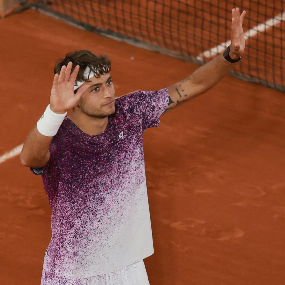 Italy's Flavio Cobolli celebrates after winning his quarter final match against Canada's Felix Auger-Aliassime, Tennis, French Open, Roland Garros, Paris, France, June 3, 2026. REUTERS/Stephanie Lecocq