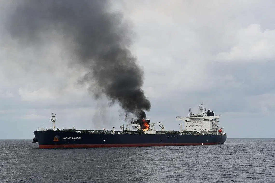 Smoke billowing from the oil tanker Marlin Luanda which was struck by a Houthi missile as it transited the Red Sea on Jan 26.
