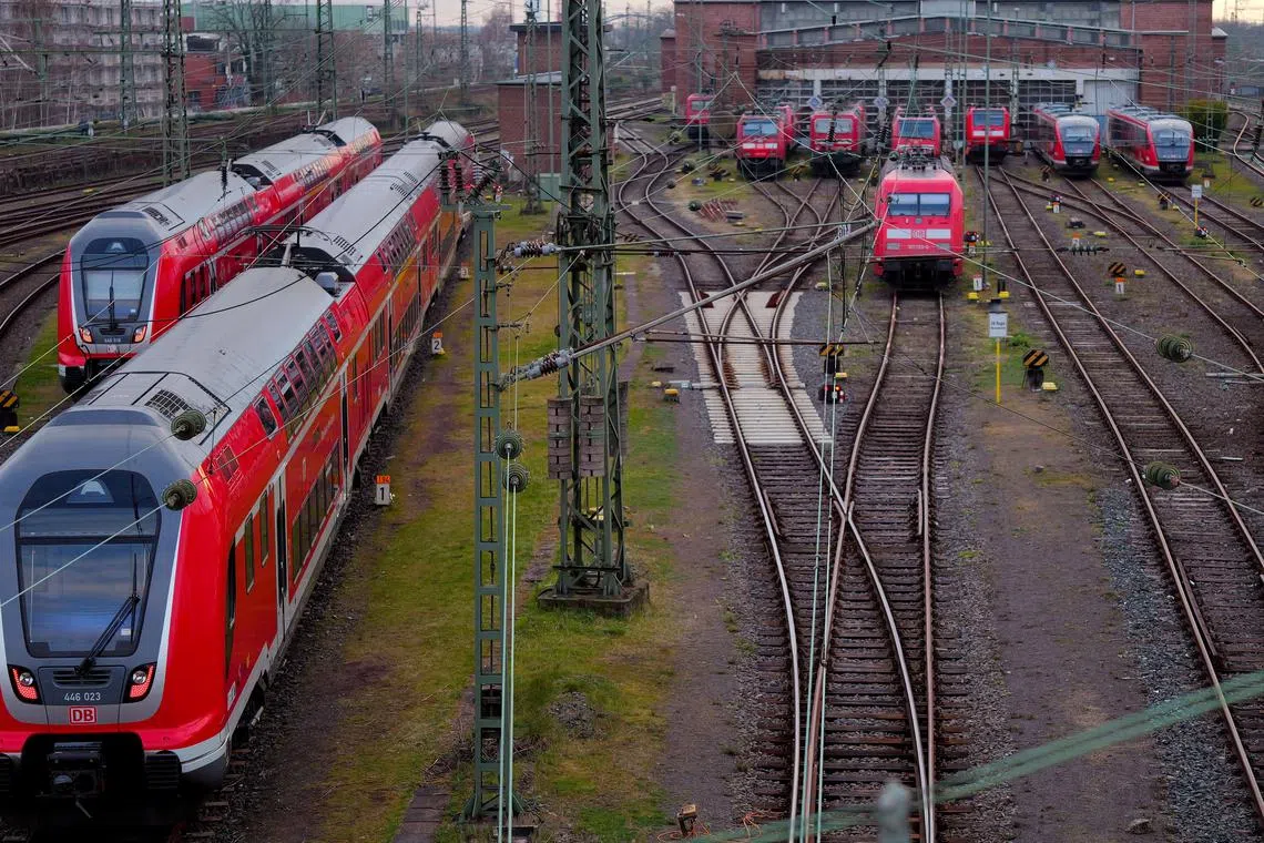 FILE PHOTO: Trains operate outside the central train station in Frankfurt, Germany, March 6, 2024. REUTERS/Kai Pfaffenbach/File Photo
