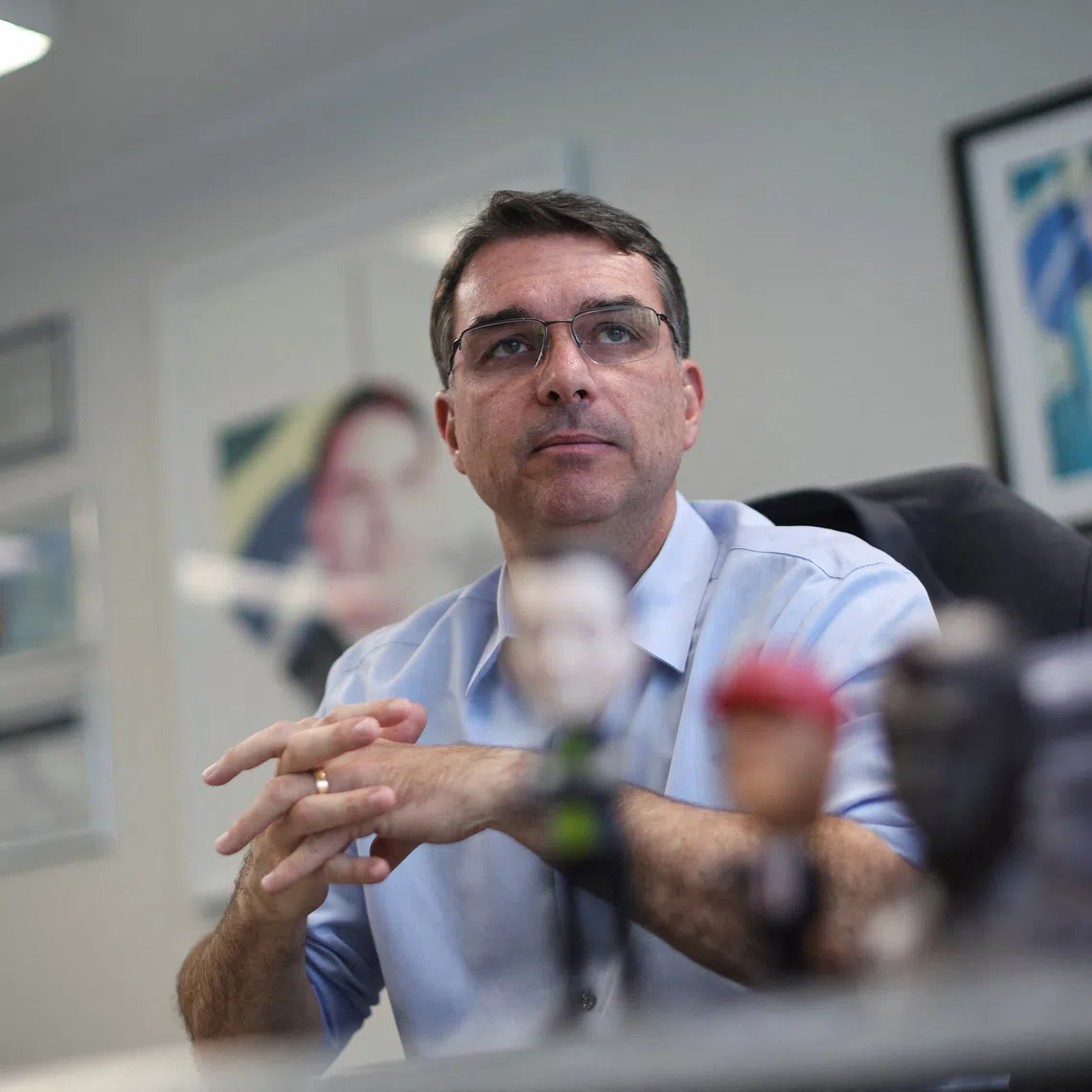 Senator Flavio Bolsonaro, son of Brazil's former President Jair Bolsonaro, attends an interview with Reuters in Brasilia, Brazil December 19, 2025. REUTERS/Adriano Machado
