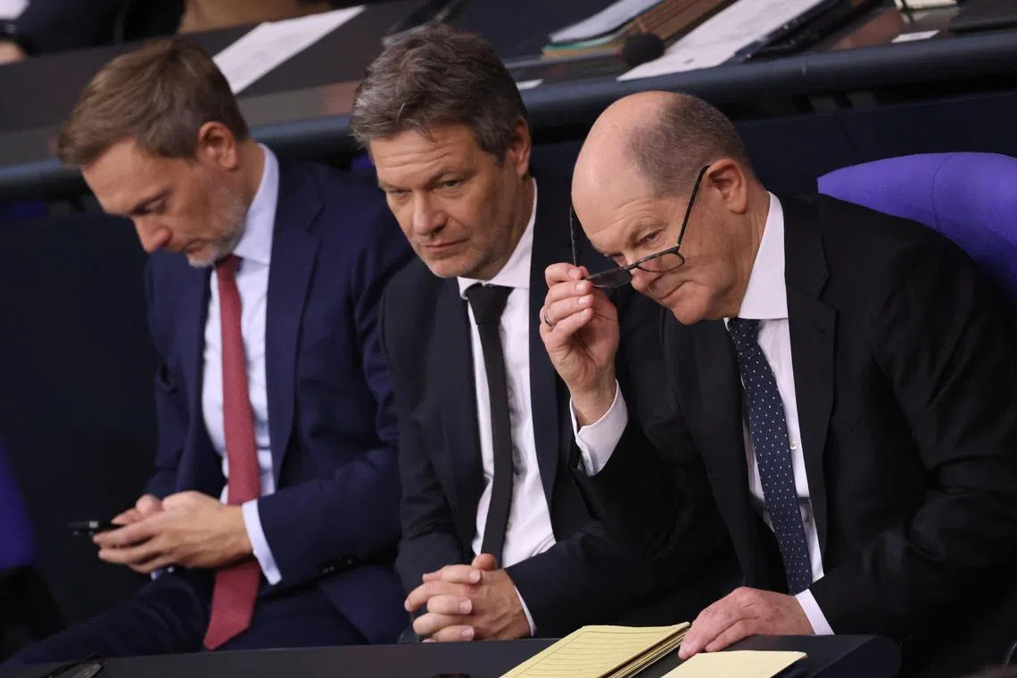 (From right) German Chancellor Olaf Scholz, Minister for Economy and Climate Robert Habeck and Finance Minister Christian Lindner at the German Parliament in Berlin.