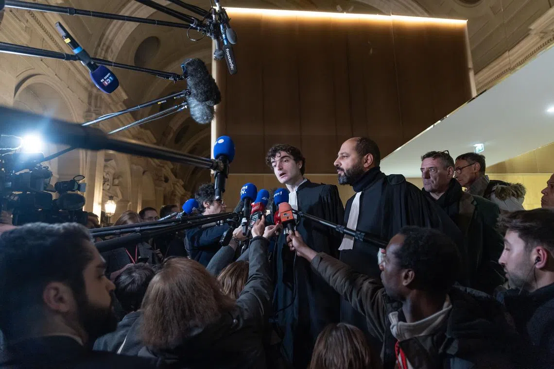 Vincent Brengarth (left) and Ouadie Elhamamouchi, lawyers of Abdelhakim Sefrioui, one of the defendants in the trial, in Paris, on Dec 20.