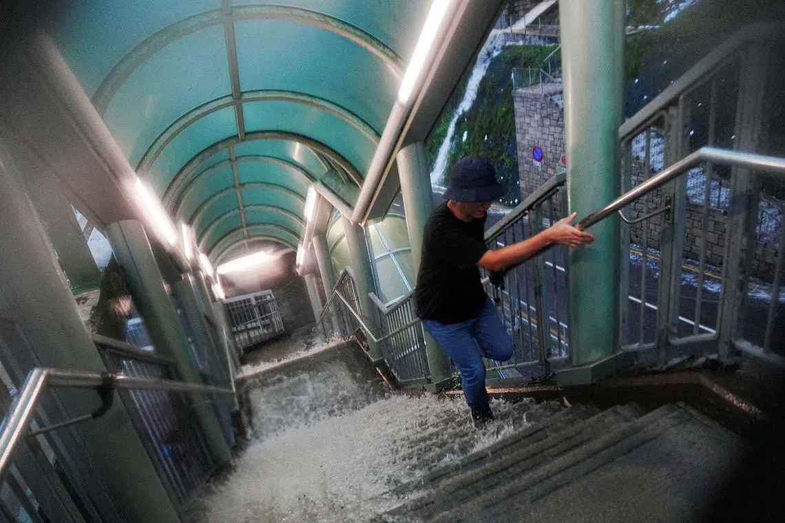 Violent storms lashed Hong Kong on Aug 5, 2025, with videos showing torrents of water cascading down hillsides in the city, breaking into white-water streams as they rushed down the many staircases linking Hong Kong’s multi-tiered cityscape. 