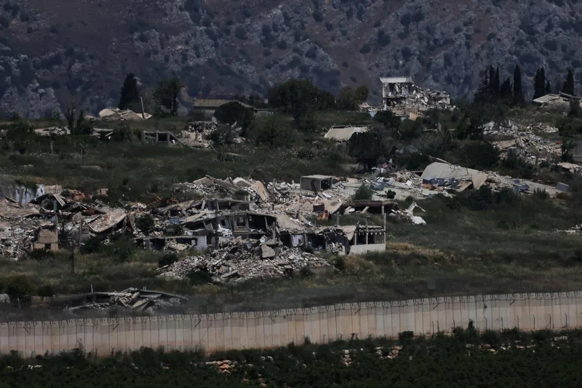 The remains of buildings in southern Lebanon, as seen from the Israeli side of the Israel-Lebanon border, in northern Israel, June 10, 2026. REUTERS/Ammar Awad