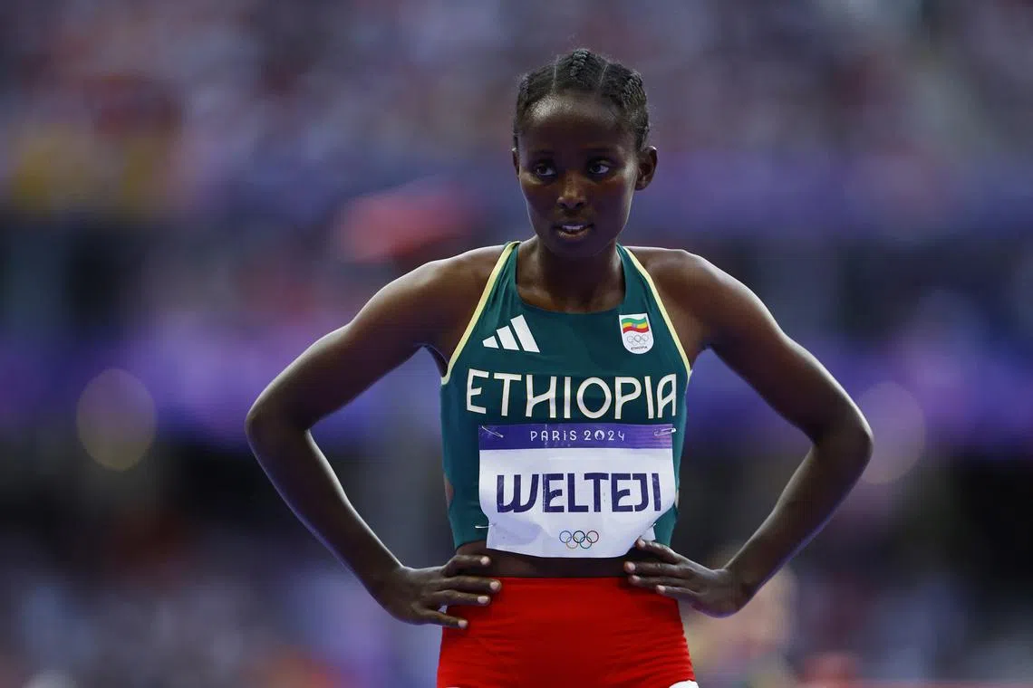 FILE PHOTO: Paris 2024 Olympics - Athletics - Women's 1500m Semi-Final 2 - Stade de France, Saint-Denis, France - August 08, 2024. Diribe Welteji of Ethiopia reacts after winning her semi final. REUTERS/Sarah Meyssonnier/File Photo