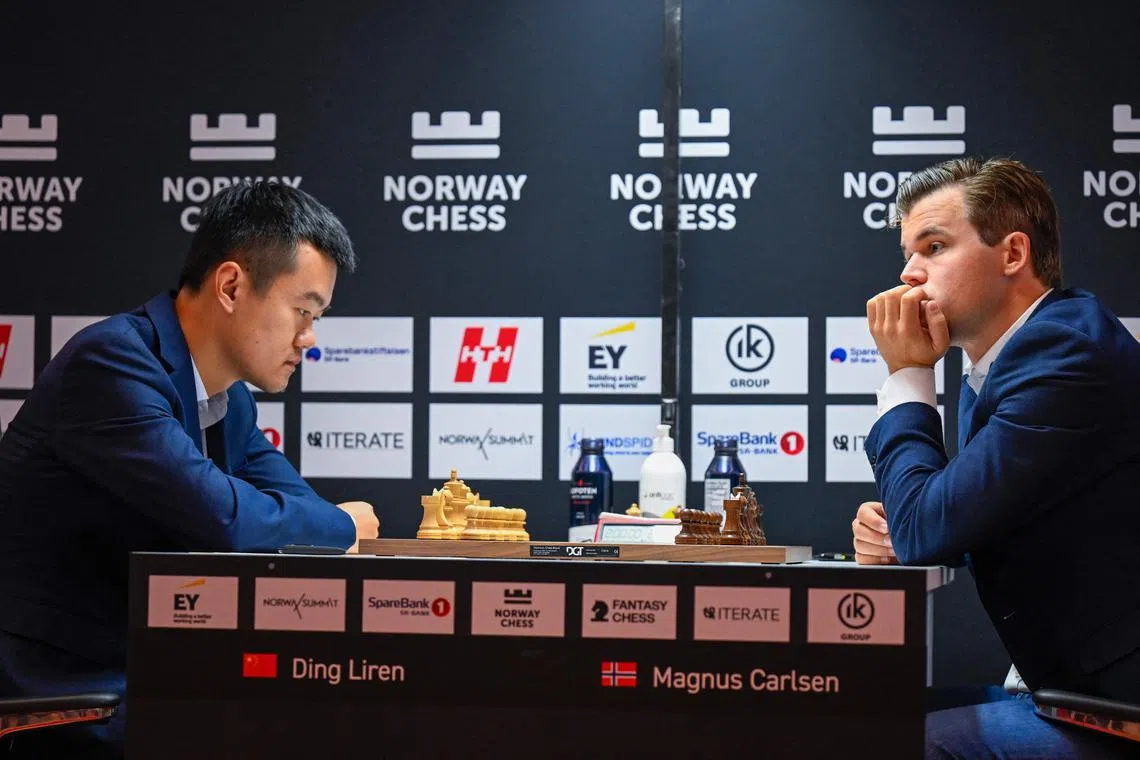 Chinese chess grandmaster Ding Liren (left)), pictured against Norway's Magnus Carlsen during the Norway Chess 2024, will face Indian challenger Gukesh Dommaraju at the world championship.