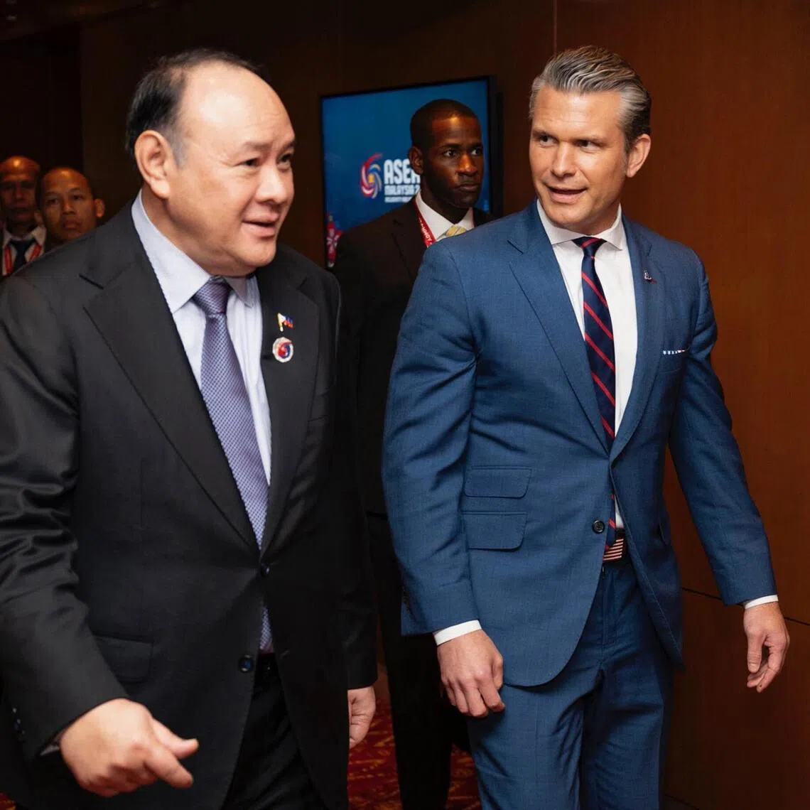 US Secretary of War Pete Hegseth (right) meets with Philippine Defence Secretary Gilberto Teodoro Jr (left) in Malaysia on October 31, 2025 to establish Task Force Philippines. 