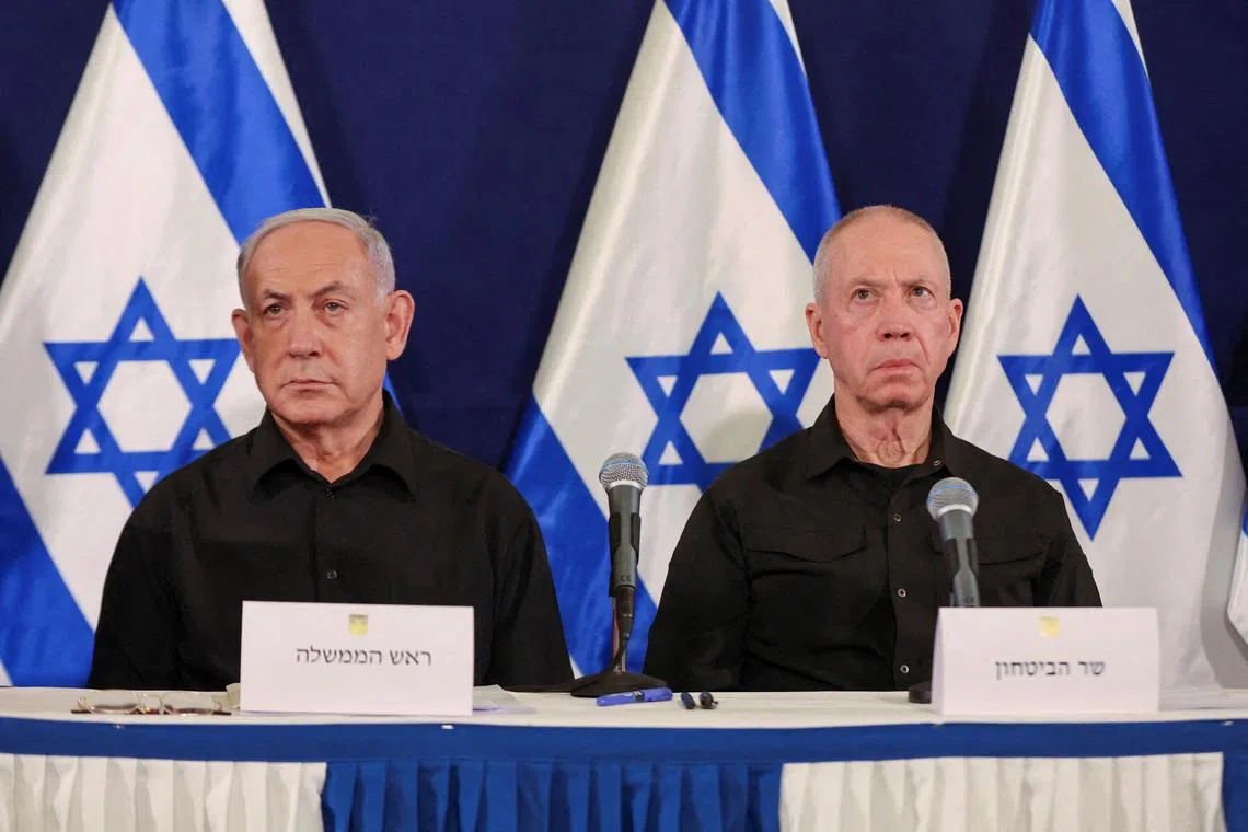 FILE PHOTO: Israeli prime minister Benjamin Netanyahu and defense minister Yoav Gallant during a press conference in the Kirya military base in Tel Aviv , Israel , 28 October  2023. ABIR SULTAN POOL/Pool via REUTERS/File Photo