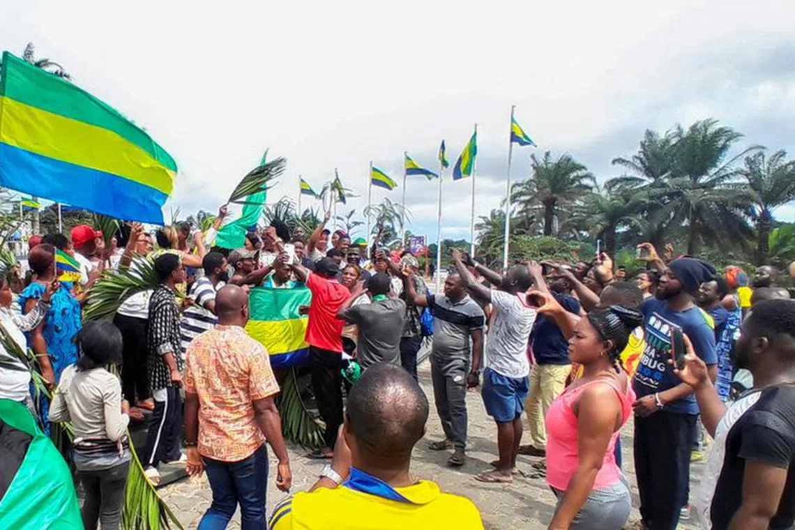 People celebrate in support of the putschists in the street of Libreville, Gabon August 30, 2023 REUTERS/Gerauds Wilfried Obangome