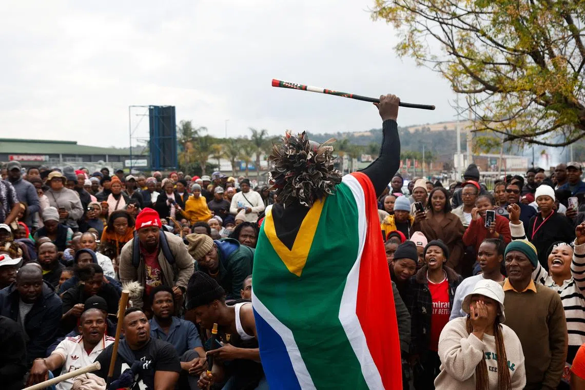 Supporters of the South African anti-immigrant group 'March and March' hold a demonstration, after an unofficial June 30 deadline set by anti-immigrant groups for undocumented migrants to leave the country had passed, in Umzimkhulu, South Africa, July 13, 2026. REUTERS/Rogan Ward