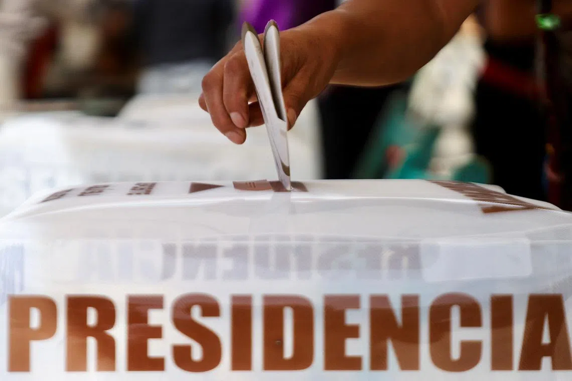 Two people were reported dead on election day after attacks on polling stations to steal ballot papers.