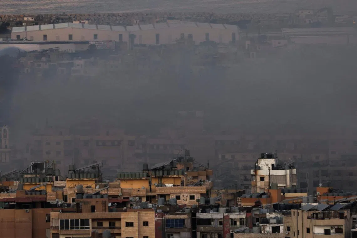 Smoke blankets buildings in Beirut in the aftermath of an Israeli strike on Oct 23. 