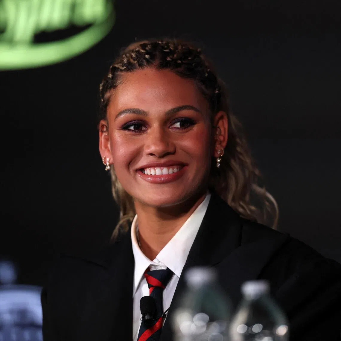 Trinity Rodman of the Washington Spirit answers questions during a press conference at BMO Stadium.