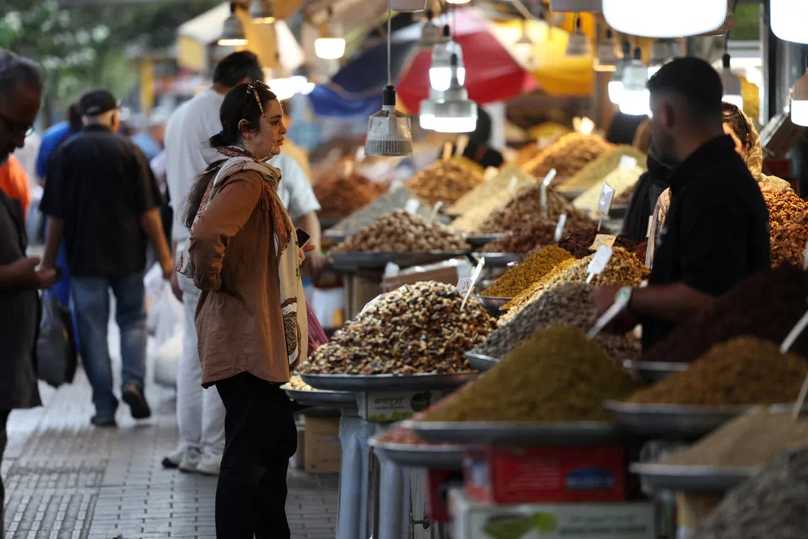 Iranians stagger under soaring costs of seven months of war