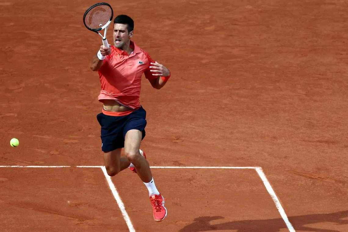 Serbia's Novak Djokovic defeats Casper Ruud of Norway in their French Open final on Sunday to lift a record-breaking 23rd Grand Slam title.