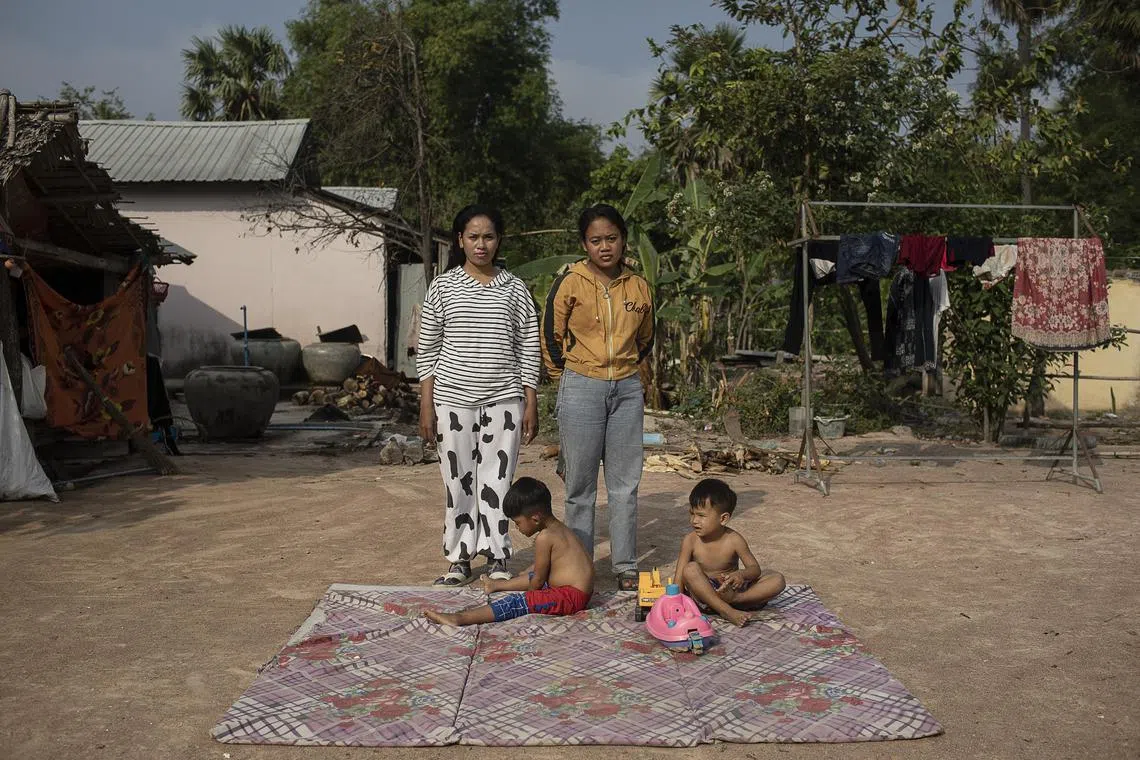 FILE Ñ Ry Ly, left, and Vin Win, who were both arrested while pregnant as surrogates and forced by the courts to raise the boys, pictured, they birthed, near their homes in a rural province west of Phnom Penh, Cambodia, Jan. 26, 2022. In CambodiaÕs weak legal system, surrogacy exists in a gray market, endangering all involved when political conditions suddenly shift and criminal charges follow. (Nadia Shira Cohen/The New York Times) -- FOR EDITORIAL USE ONLY WITH CAMBODIA-SURROGACY BY HANNAH BEECH ON SAT. NOV. 26, 2022. ALL OTHER USE PROHIBITED.