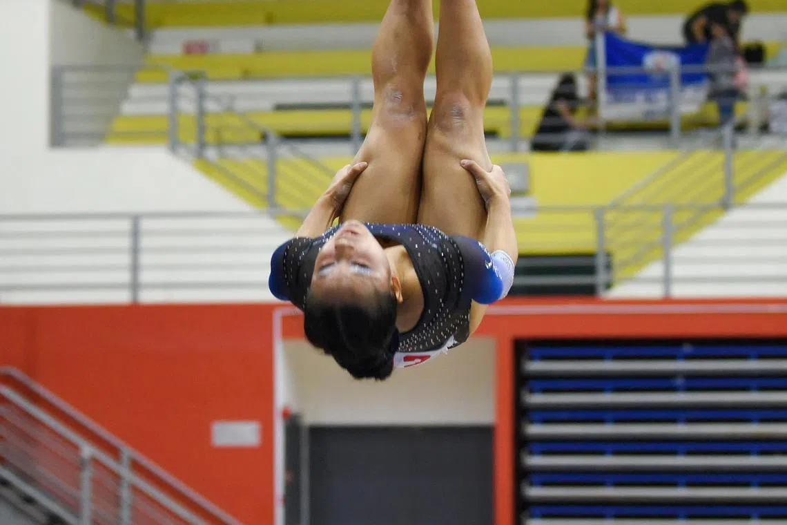 CHIJ St Nicholas Girl's School (Secondary) student Danielle Fong executing her routine in the vault final of the National School Games' artistic gymnastics competition on April 21, 2023.