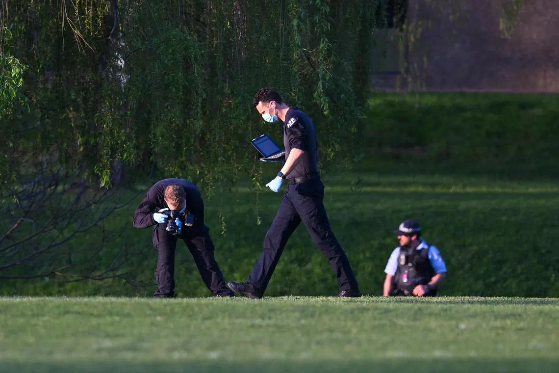 Police forensics officers working at a crime scene after a stabbing at the Australian National University in Canberra on Sept 18.