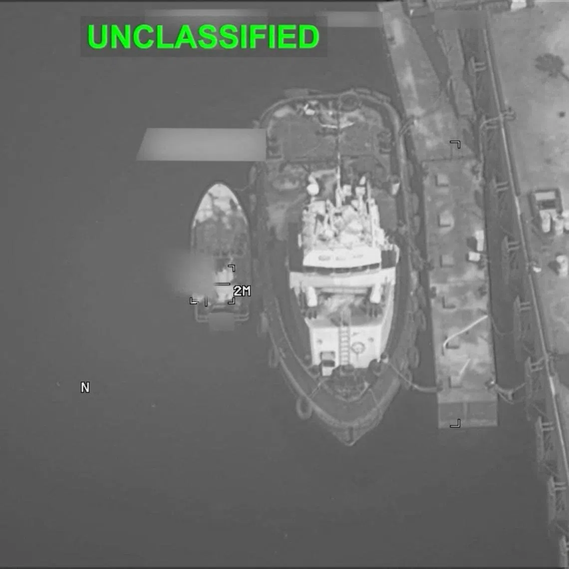 A boat is targetted, at an unknown location, during what the US Central Command says are strikes on Iranian military targets, in this screengrab taken from a handout video released on July 23.