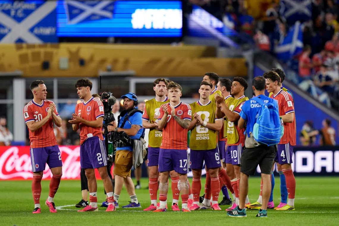 Soccer Football - FIFA World Cup 2026 - Group C - Haiti v Scotland - Boston Stadium, Foxborough, Massachusetts, U.S. - June 13, 2026 Scotland players celebrate after the match IMAGN IMAGES via Reuters/David Butler Ii