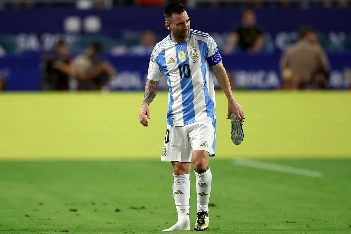 FILE PHOTO: Soccer Football - Copa America 2024 - Final - Argentina v Colombia - Hard Rock Stadium, Miami, Florida, United States - July 14, 2024 Argentina's Lionel Messi looks dejected after being substituted due to an injury REUTERS/Agustin Marcarian/File Photo