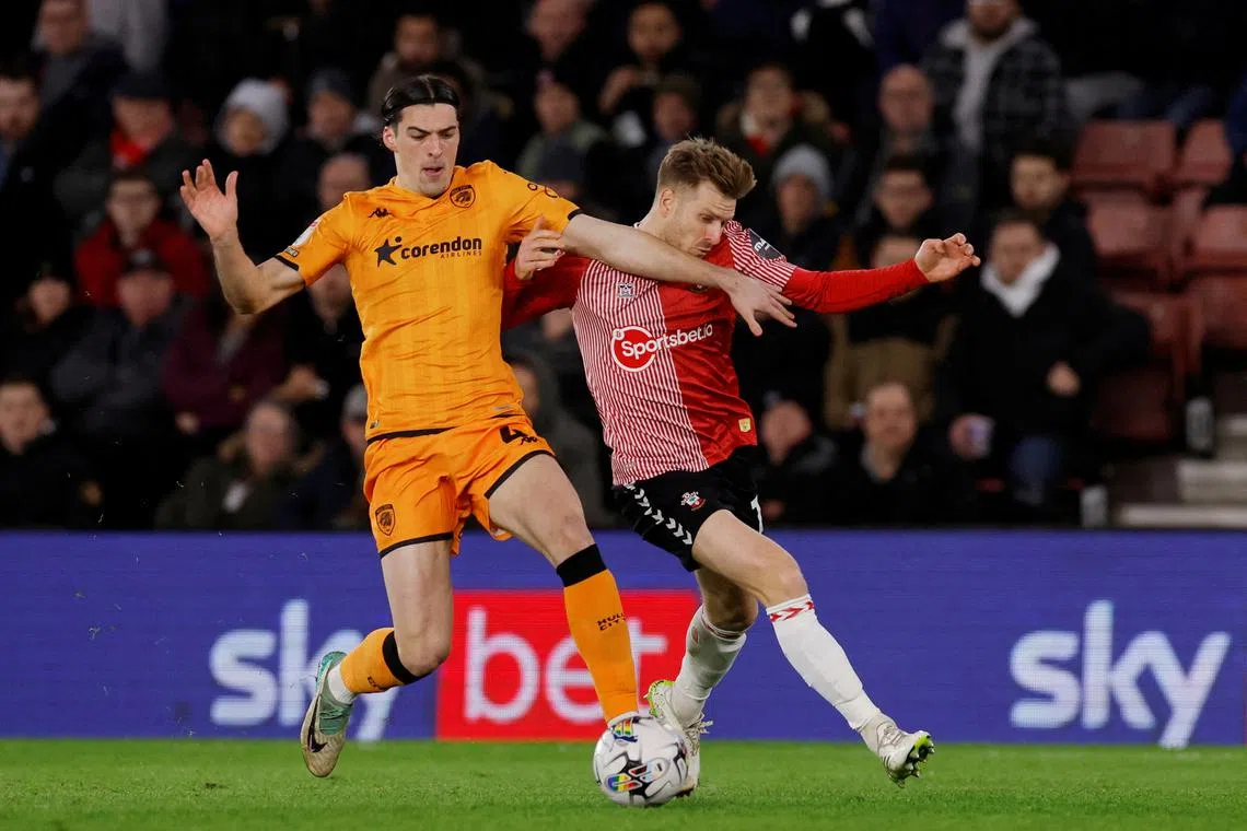 FILE PHOTO: Soccer Football - Championship - Southampton v Hull City - St Mary's Stadium, Southampton, Britain - February 20, 2024 Hull City's Jacob Greaves in action with Southampton's Stuart Armstrong Action Images/Andrew Couldridge