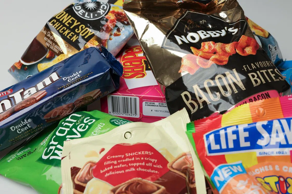 Popular snacks in Australia can be found in local supermarkets like Coles and Woolsworth. 