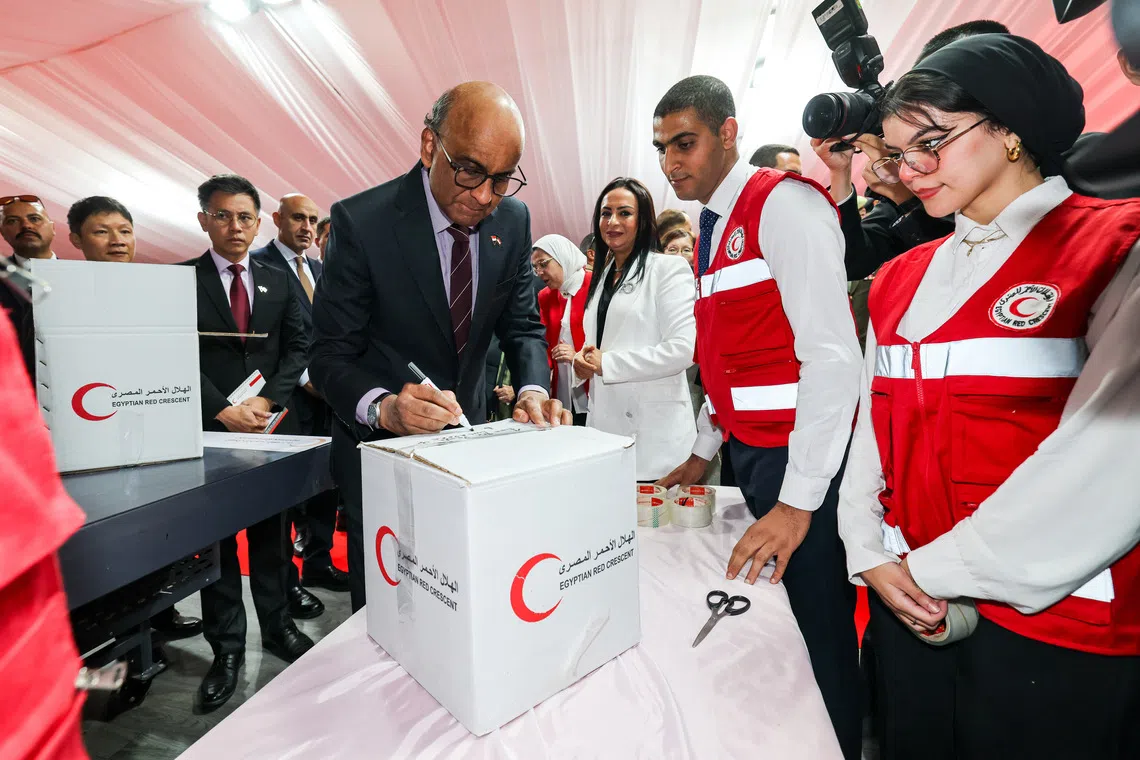 President Tharman Shanmugaratnam visiting the Egyptian Red Crescent headquarters while on his state visit to Cairo on Sept 21.