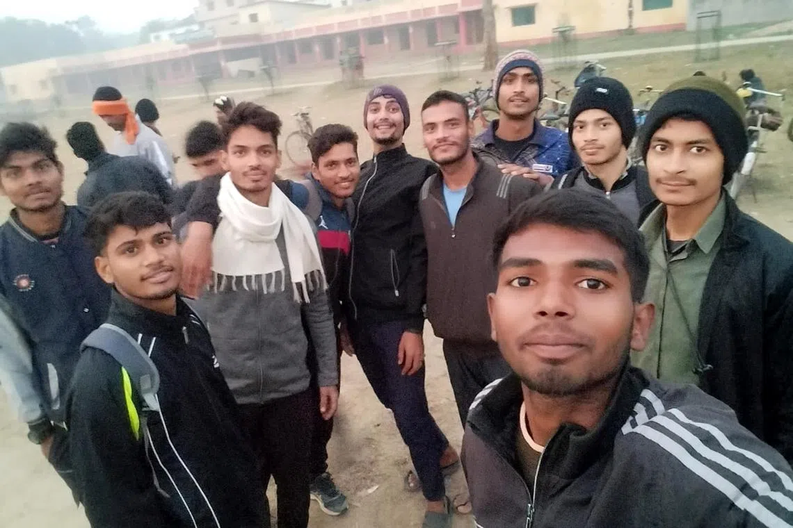 rmarmy - Farmer's son Ajay Kumar, 21, (striped jacket) from Begusarai, Bihar, exercised from 4am to 7am with hundreds of other boys in his village since he was 17 years old, all to get a permanent job in the army. After he failed the interview last year, he wishes he had done a graduation course instead. 

Photo courtesy: Ajay Kumar
