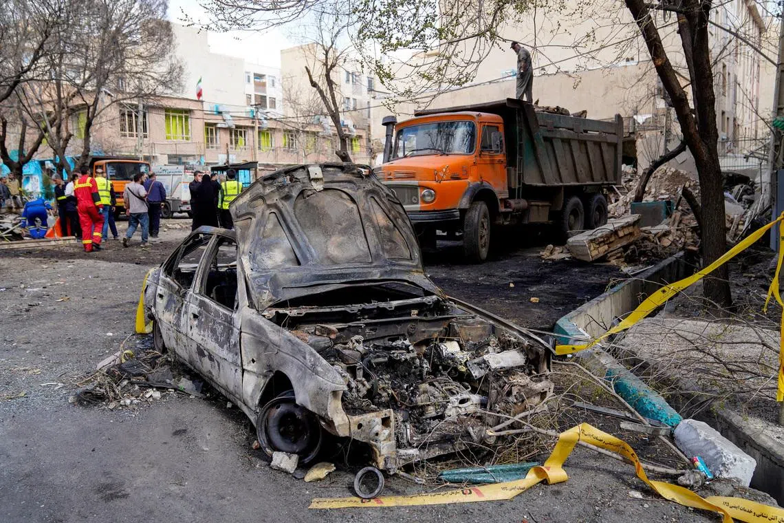 Remains of a car in the aftermath of an Israel and the U.S. strike on a building in Tehran, Iran, on Feb 28, 2026. 