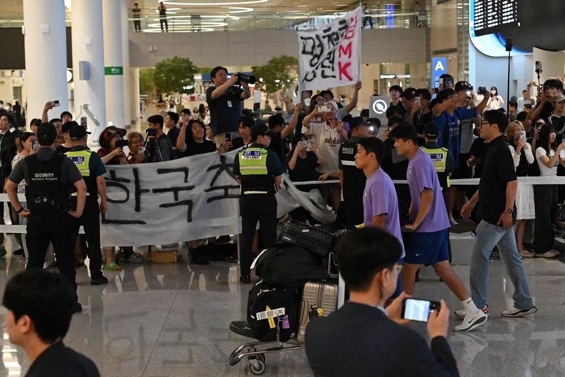 South Korea’s football team members arrive following the team’s elimination in the group stage of the FIFA World Cup 2026 at Seoul-Incheon International Airport on June 30.
