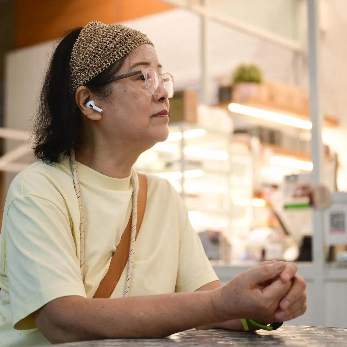 ST20241101_202430000791 sahearing03 Azmi Athni/Sarah Koh//

Retired general manager Lilian Ang, 76, who has hearing impairment, reviewing the new Apple Airpods Pro 2 Hearing Health feature in a cafe on Nov 1. 

ST PHOTO: AZMI ATHNI
