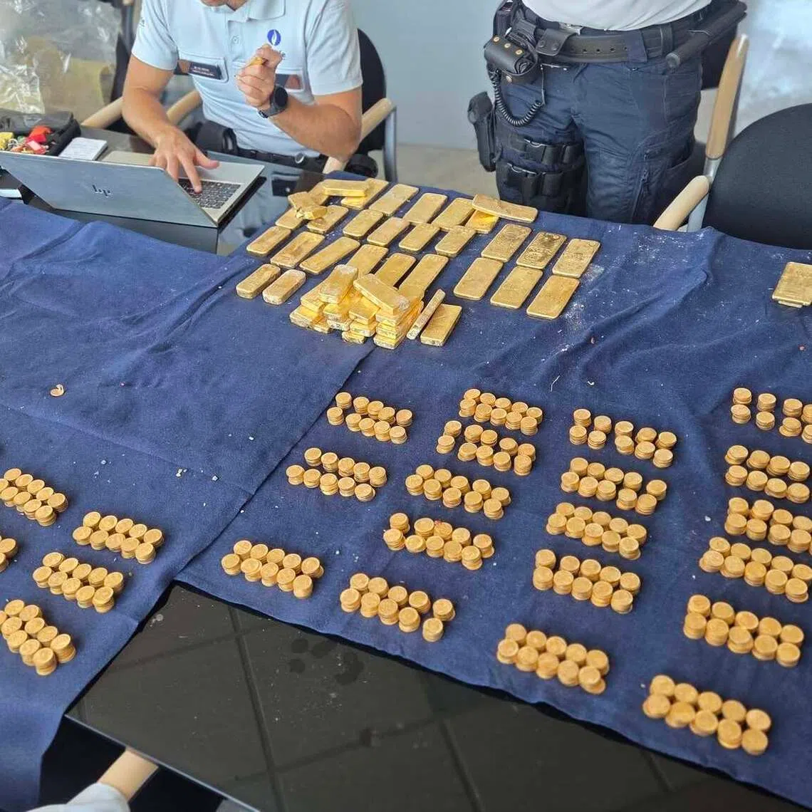 Gold bars and coins worth several million dollars were found in the cellar walls of a house belonging to a local charity that was undergoing renovation.