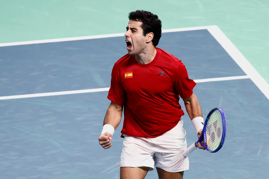 Tennis - Davis Cup - Final 8 - Spain v Czech Republic - SuperTennis Arena, Bologna, Italy - November 20, 2025 Spain's Jaume Munar celebrates after winning his match against Czech Republic's Jiri Lehecka REUTERS/Alessandro Garofalo