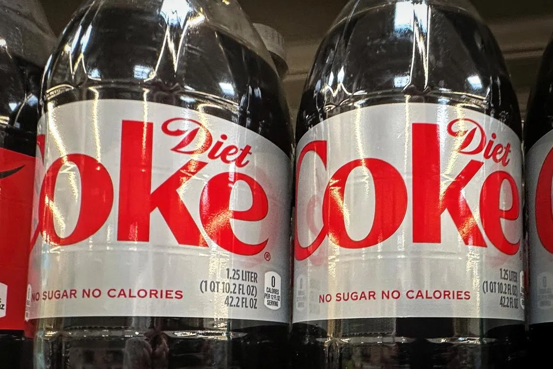 Bottles of Diet Coke are seen on display at a market in New York City, New York, U.S., June 28, 2023. REUTERS/Mike Segar