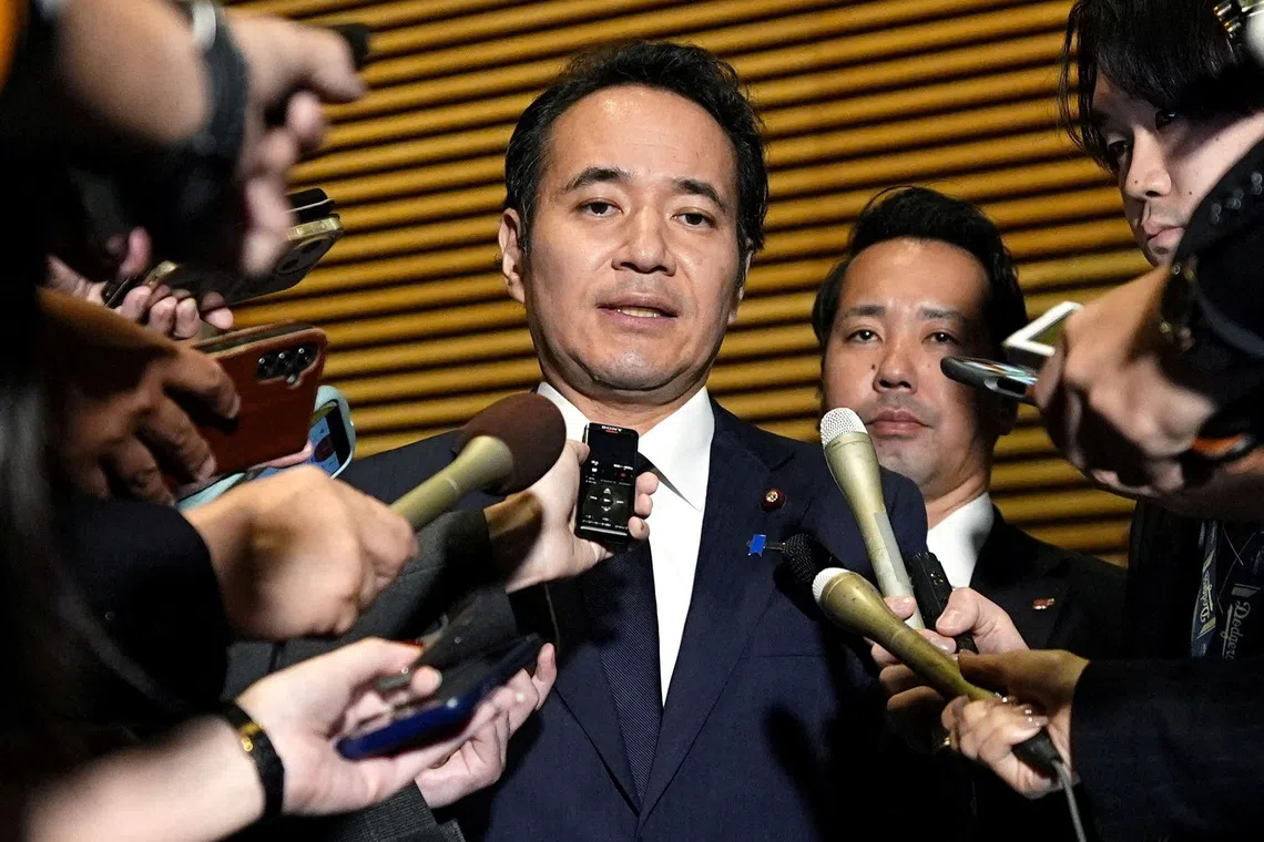 Japan's Minister for Agriculture, Forestry and Fisheries Kazuo Yana speaks to media after expressing his intention to resign to the Prime Minister Sanae Takaichi at Takaichi's official residence in Tokyo, Japan October 14, 2026, in this photo taken by Kyodo. Kyodo/via REUTERS