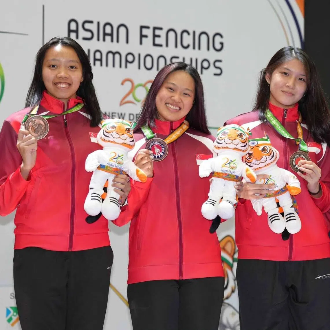 (From left) Fencers Kiria Tikanah Abdul Rahman, Elle Koh, Esther Tan and Denise Seah clinched Singapore's first-ever women's epee team medal at the Asian Fencing Championships on June 24.