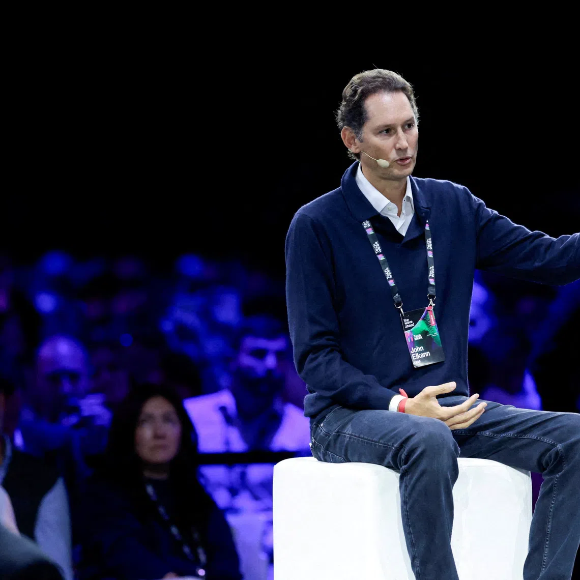 FILE PHOTO: Stellantis Chairman, and Exor CEO John Elkann gestures as he speaks during the Italian Tech Week 2025, in Turin, Italy October 3, 2025. REUTERS/Remo Casilli/File Photo