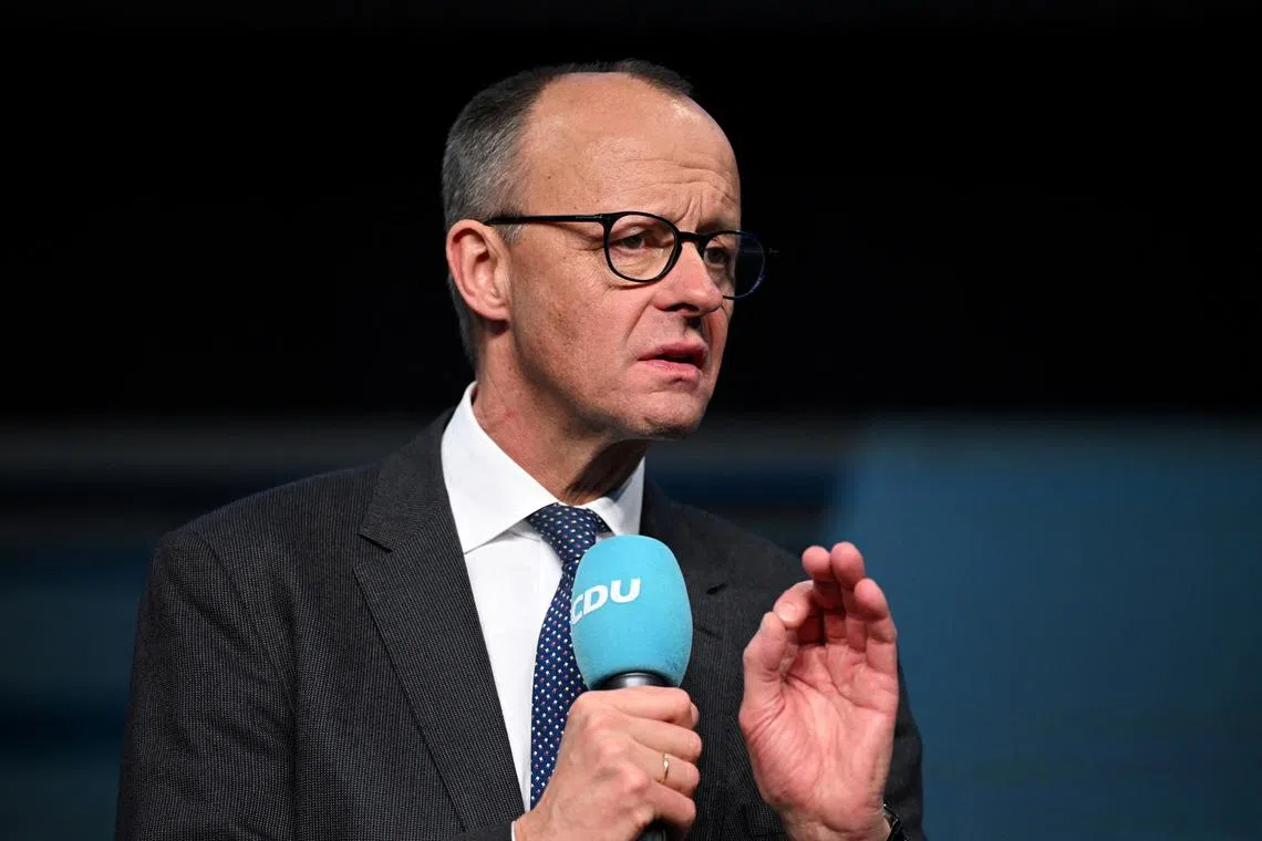 FILE PHOTO: German conservative candidate for chancellor and Christian Democratic Union (CDU) party leader Friedrich Merz speaks in Neubrandenburg, Germany, February 12, 2025. REUTERS/Annegret Hilse/File Photo