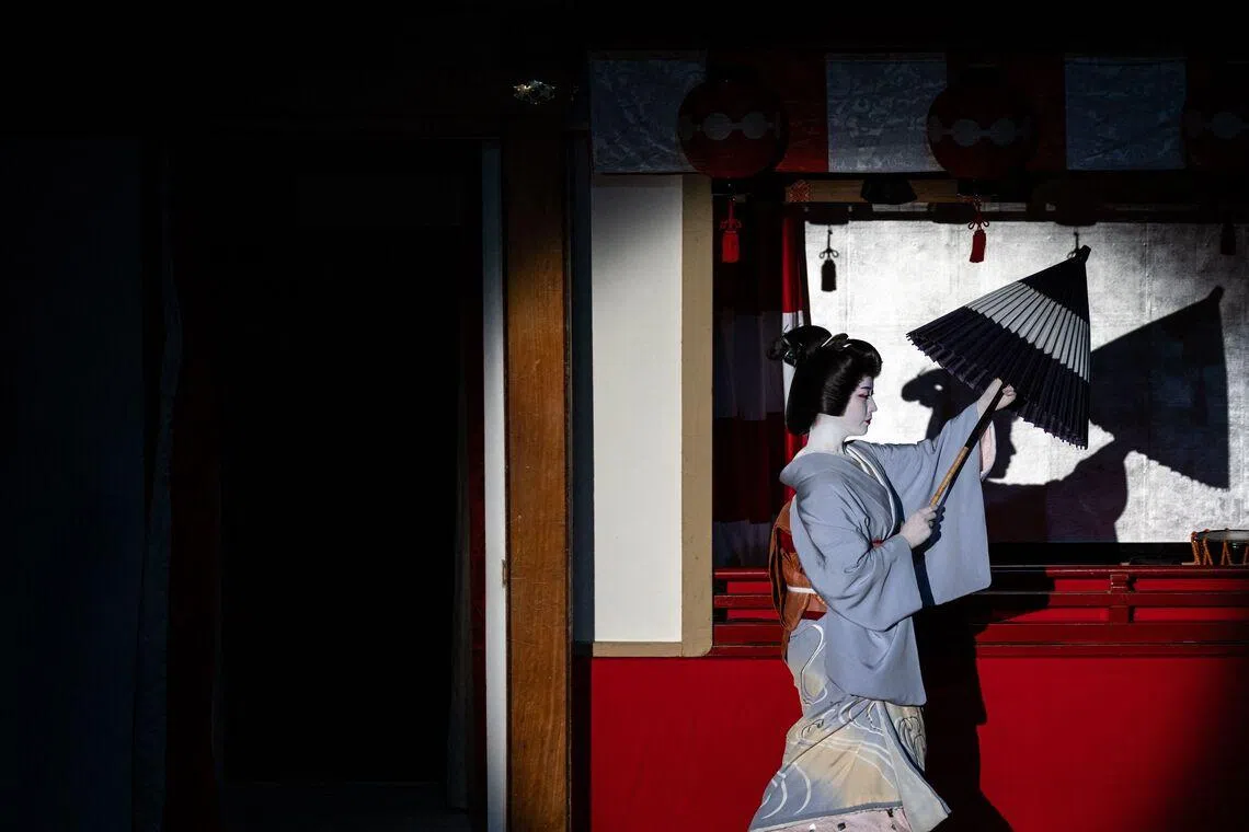 A geisha takes part in a rehearsal for the annual "Miyako Odori" -- which means "capital city dance" in Japanese, at the Gion Kobu Kaburenjo in Kyoto, Japan on March 31, 2026. 