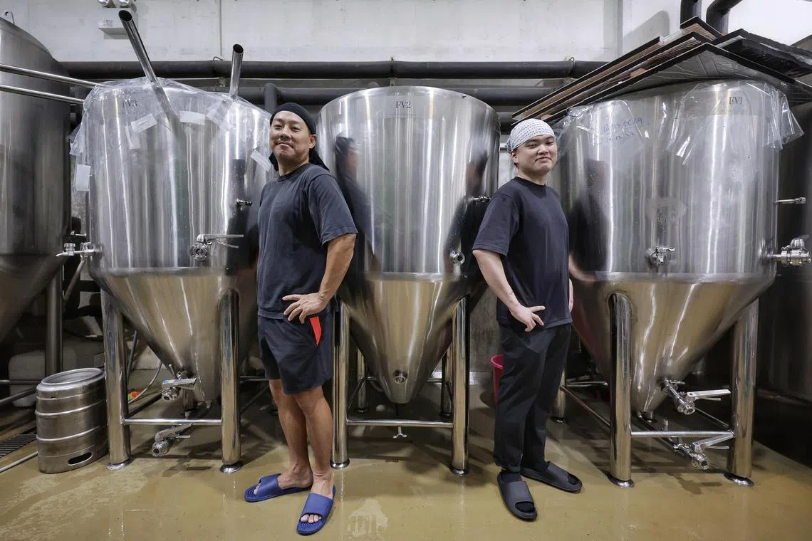 Partners at Orchid Craftworks Yosuke Hosoi (left), 40, and Reuben Oh, 30, at the premises of Singapore's first sake brewery on Aug 5, 2024.