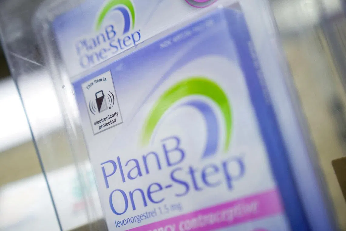 FILE PHOTO: A package of PlanB One-Step, an emergency contraceptive pill, is seen in security packaging at a CVS Pharmacy in Washington, U.S., July 7, 2022. REUTERS/Sarah Silbiger/File Photo