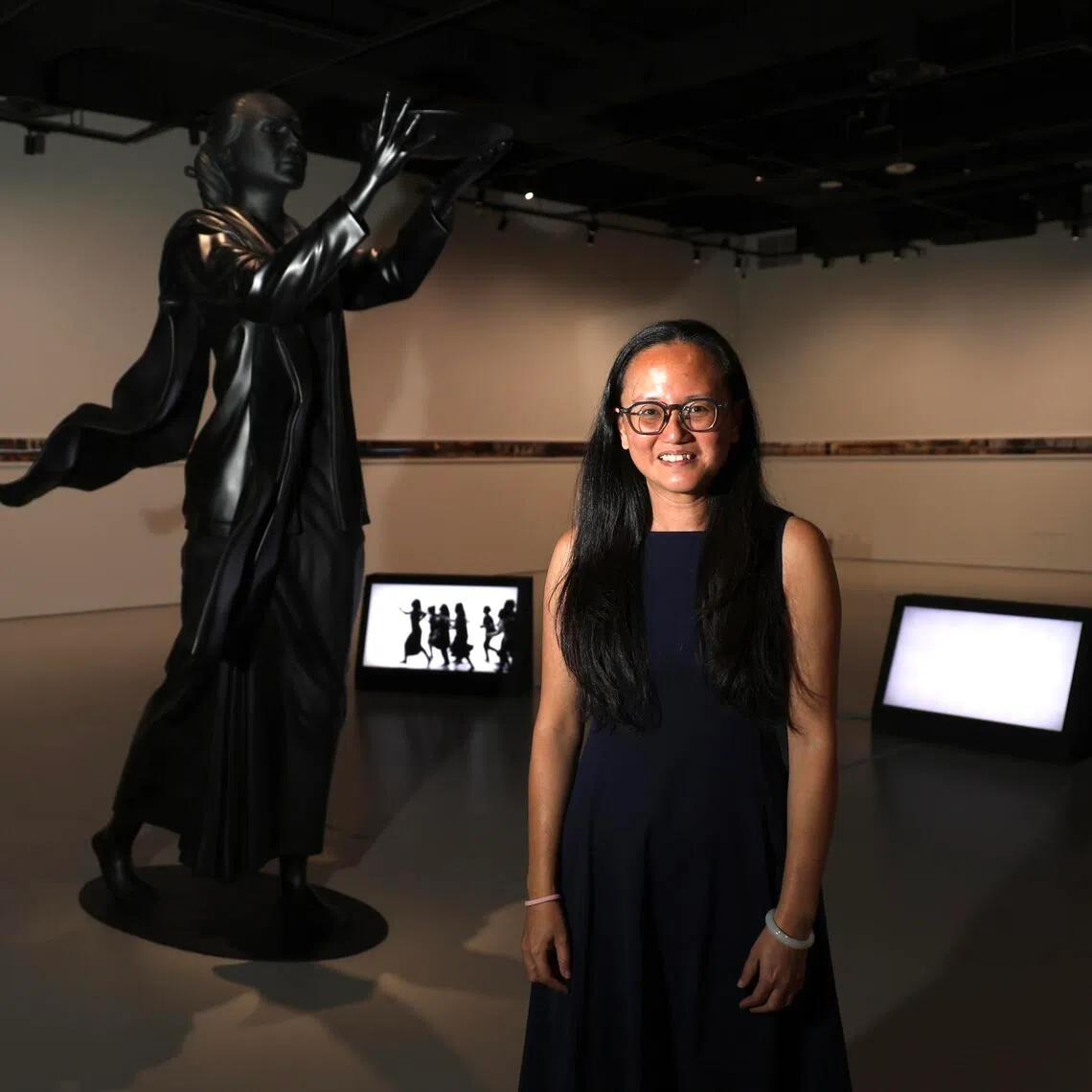 Curator Ong Puay Khim with a sculpture by Malaysian artist Nadiah Bamadhaj at SAM’s new show, SAMCollection: The Present Is Unstable.