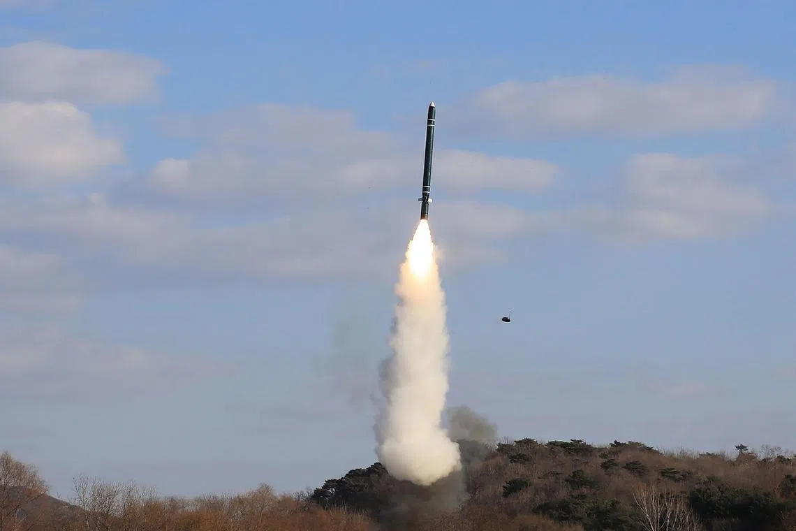 A photo taken on Jan 25 and released by KCNA shows the test-firing of a underwater-to-surface strategic cruise missile in North Korea.