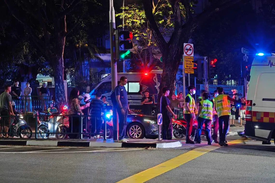 When The Straits Times arrived at the scene, there were two ambulances. A stretcher meanwhile was carrying a casualty.