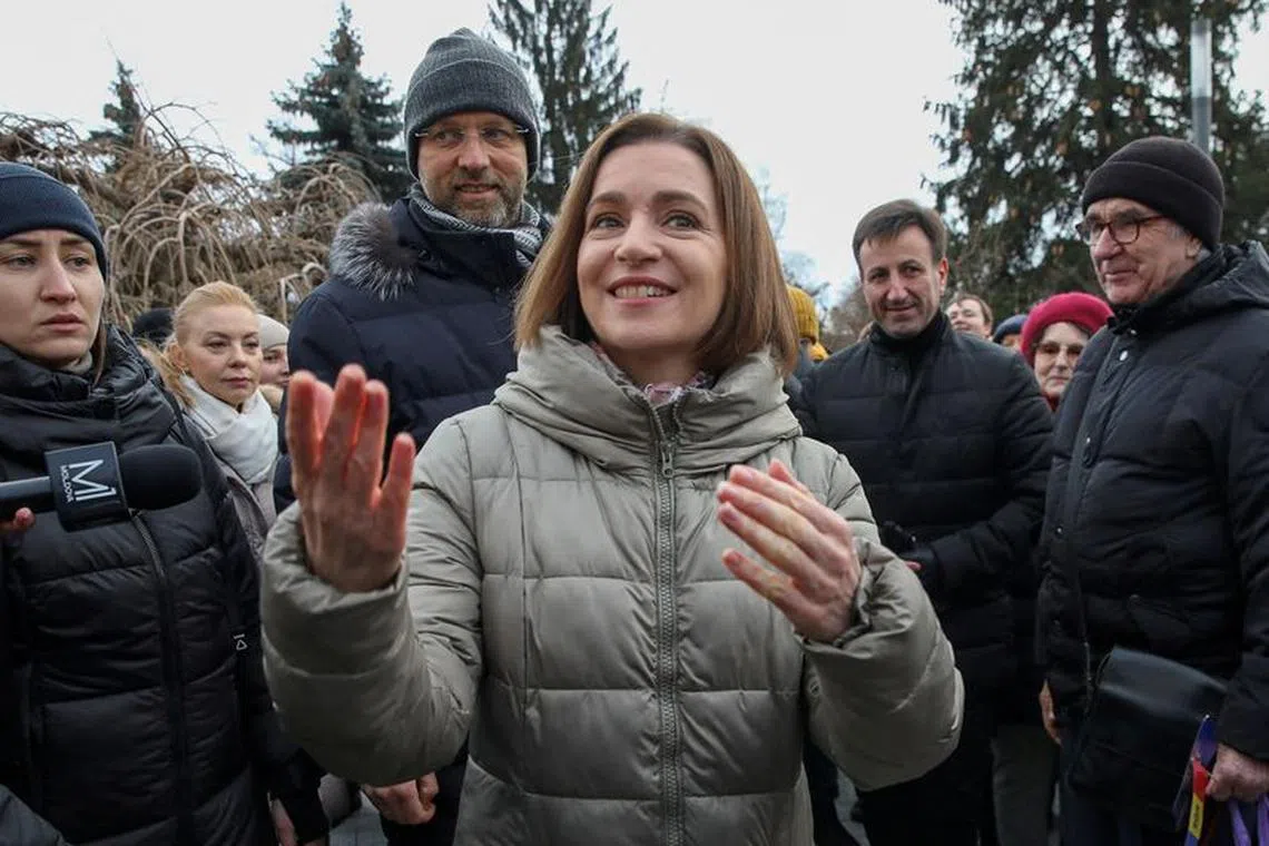 Moldovan President Maia Sandu attends a rally and concert, celebrating the European Union's decision to open membership talks with Moldova, in Chisinau, Moldova, December 17, 2023. REUTERS/Vladislav Culiomza/File Photo
