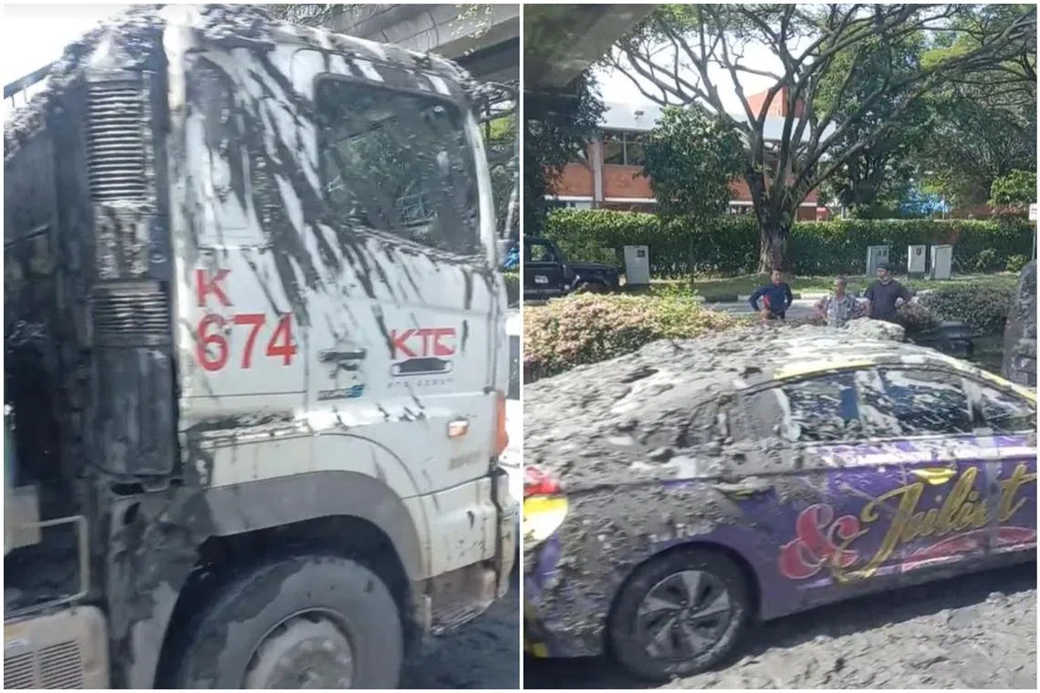 The accident involved two tipper trucks, two vans and a taxi, and left what appeared to be cement spilt on four of the vehicles and the road.