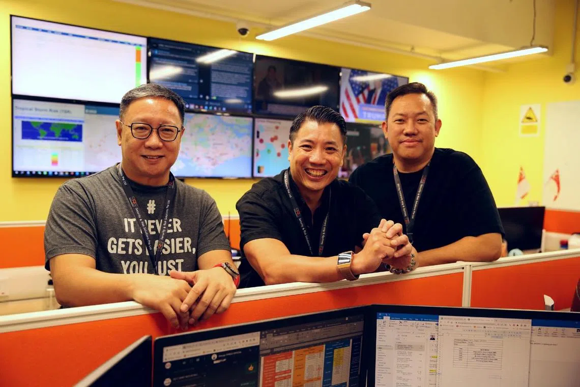 (From left) Security & Risk Solutions' chief operating officer Jon Lium, chief executive Amos Kng and deputy chief executive Paul Rachmadi.