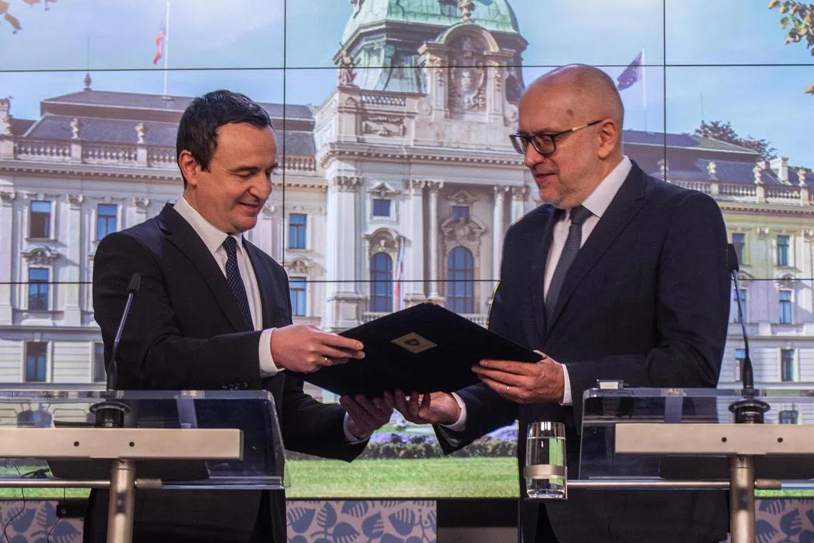 KAlbin Kurti handed the application to Czech minister for EU affairs Mikulas Bek, whose country currently holds the rotating six-month presidency of the 27-member bloc.of EU. Kosovo’s President Vjosa Osmani, Prime Minister Albin Kurti, and Parliament Speaker Glauk Konjufca signed the application for EU membership on 14 December 2022.  EPA-EFE/MILAN KAMMERMAYER