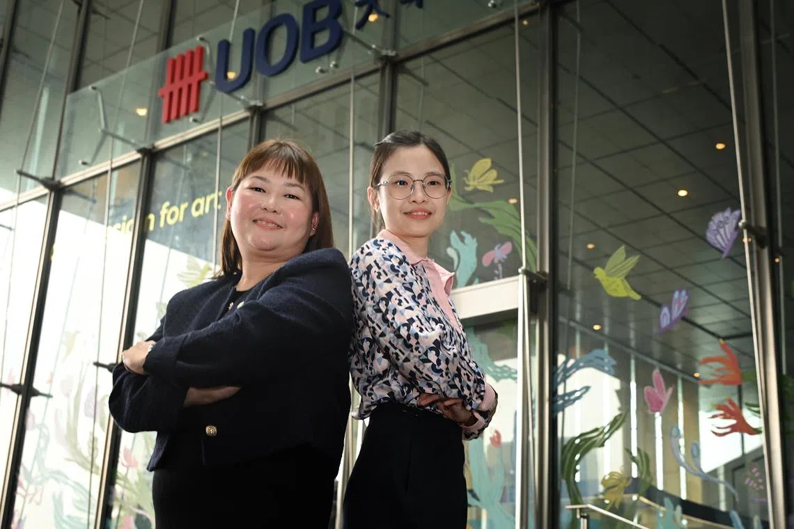 UOB branch assistant branch manager Jasmine Tay (left) and service executive Grace Ng, whose actions lead to the arrest of a man who allegedly tried to scam an 80-year-old woman.